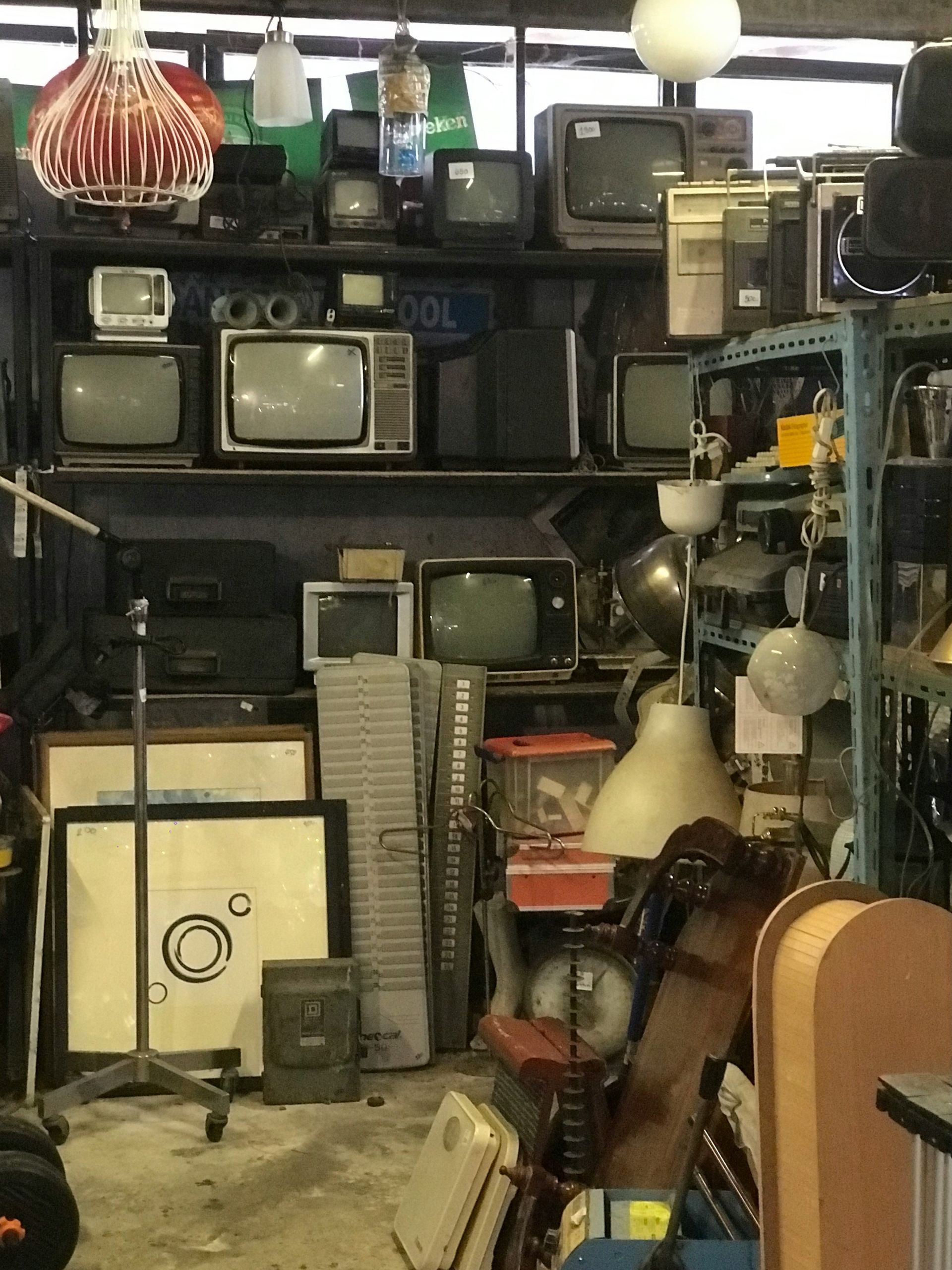 A room filled with lots of different types of electronics